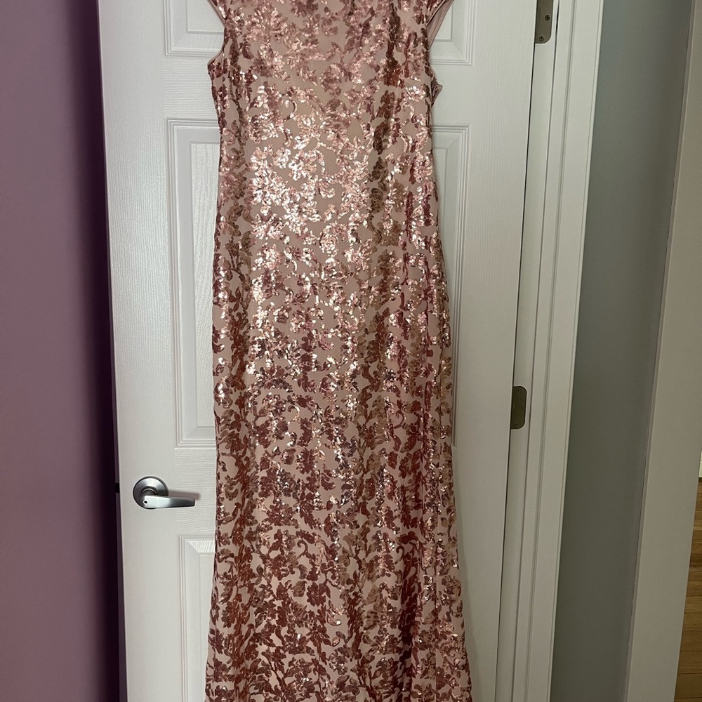 Rose gold gown. Flattering silhouette with modest neckline and draped back.